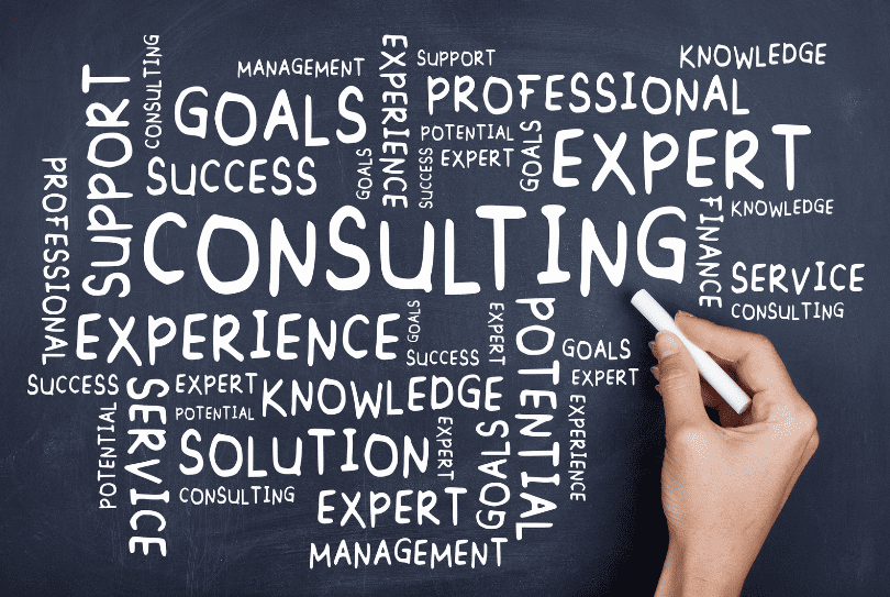 A person writing on the wall of consulting