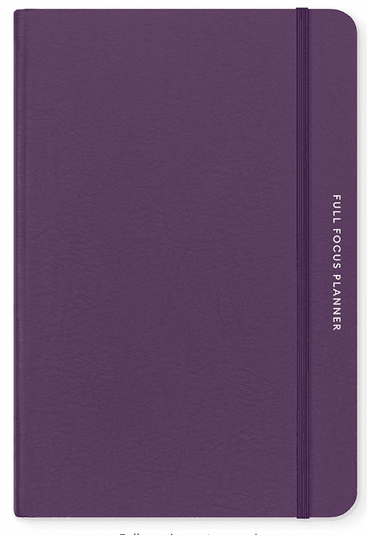 A purple notebook with the cover open.