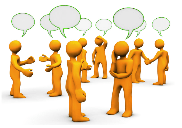 A group of people with speech bubbles above them.